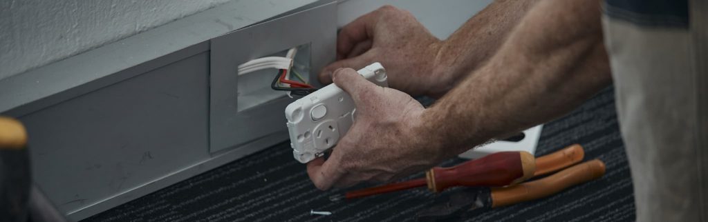 electrician installing a power point