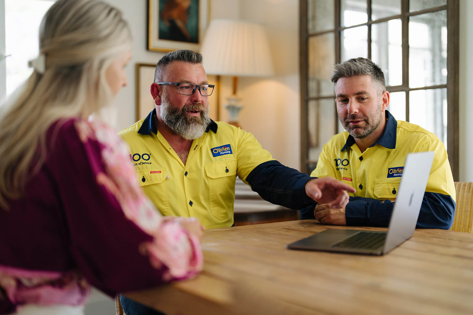 obrien wyong plumbers sitting at table