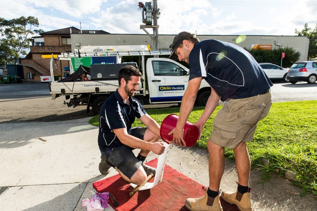 Plumbers performing pipe relining in Wollongong