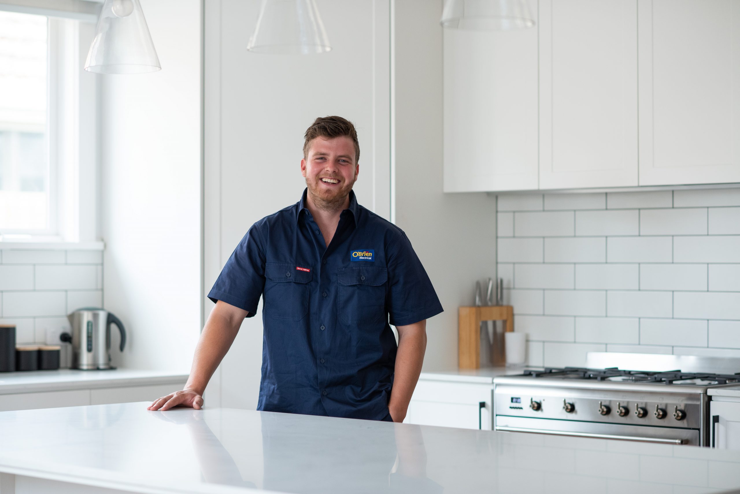 Electrician in kitchen